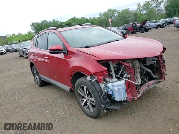 2016 Toyota RAV4 XLE with VIN 2T3RFREVXGW434477, listed as a Copart auction lot 62471185 with 116,779 mi miles and Salvage title. Bid and sale history available at DreamBid. Image 14.