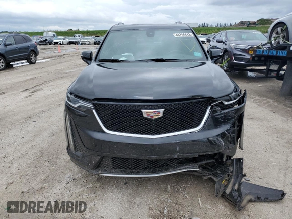 2021 Cadillac XT6 Sport z VIN 1GYKPGRSXMZ174395, wystawiony jako Copart lot #48786443 z przebiegiem 41 846 mil mil oraz . Historia ofert i sprzedaży dostępna na DreamBid. Obrazek 5.