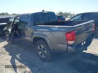 2017 Toyota Tacoma SR5 with VIN 5TFAZ5CN7HX033594, listed as a IAAI auction lot 41881117 with 86,676 mi miles and . Bid and sale history available at DreamBid. Image 3.