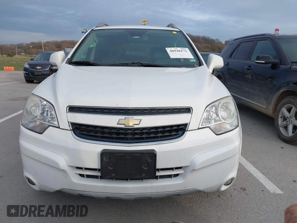 2014 Chevrolet Captiva Sport LTZ z VIN 3GNAL4EK6ES631467, wystawiony jako IAAI lot #40948171 z przebiegiem 146 395 mil mil oraz . Historia ofert i sprzedaży dostępna na DreamBid. Obrazek 13.