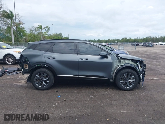 2023 Kia Sportage SX-Prestige with VIN KNDPXCAG7P7071365, listed as a IAAI auction lot 42247639 with 21,509 mi miles and . Bid and sale history available at DreamBid. Image 14.
