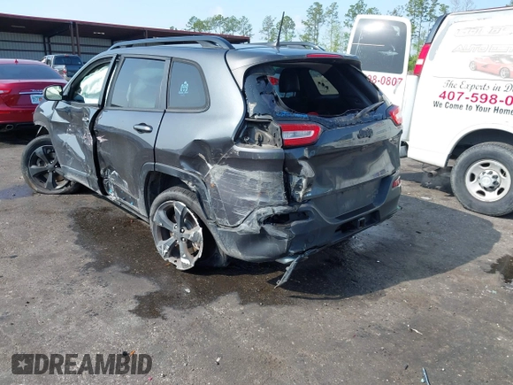 2016 Jeep Cherokee Latitude with VIN 1C4PJMCS9GW103845, listed as a IAAI auction lot 41933274 with 177,472 mi miles and . Bid and sale history available at carsss.com. Image 3.