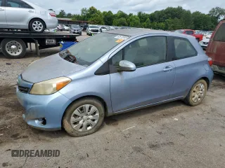 2012 Toyota Yaris L z VIN JTDJTUD30CD504505, wystawiony jako Copart lot #60573595 z przebiegiem 149 297 mil mil oraz Czysty tytuł • Clean title. Historia ofert i sprzedaży dostępna na DreamBid. Obrazek 1.