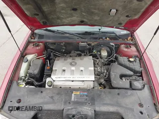 2001 Cadillac Seville z VIN 1G8KS54Y91U227846, wystawiony jako IAAI lot #42134095 z przebiegiem 216 766 mil mil oraz . Historia ofert i sprzedaży dostępna na DreamBid. Obrazek 10.