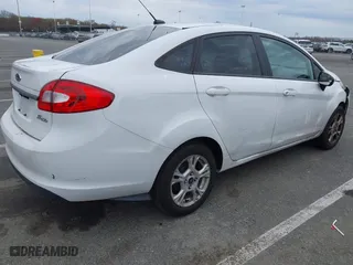 2013 Ford Fiesta S with VIN 3FADP4AJ5DM213417, listed as a IAAI auction lot 42023314 with 65,261 mi miles. Bid and sale history available at carsss.com. Image 4.