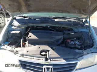 2004 Honda Odyssey EX-L with VIN 5FNRL18944B043710, listed as a IAAI auction lot 41862417 with 380,589 mi miles and . Bid and sale history available at DreamBid. Image 10.