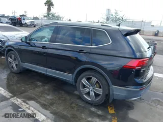 2018 Volkswagen Tiguan Wolfsburg Edition with VIN 3VV5B7AX7JM154967, listed as a IAAI auction lot 41433312 with 61,679 mi miles. Bid and sale history available at carsss.com. Image 3.