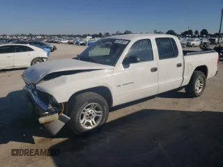 2001 Dodge Dakota Sport with VIN 1B7HL2AN31S328681, listed as a Copart auction lot 76413804 with 135,576 mi miles and Salvage Title. Bid and sale history available at carsss.com. Image 1.
