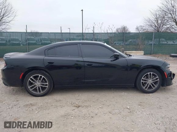 2019 Dodge Charger SXT with VIN 2C3CDXJG7KH757728, listed as a IAAI auction lot 41797017 with 68,063 mi miles and . Bid and sale history available at DreamBid. Image 12.