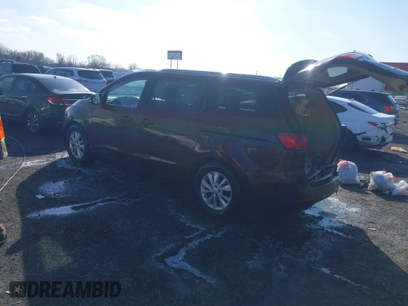 2015 Kia Sedona LX with VIN KNDMB5C14F6059569, listed as a IAAI auction lot 41564739 with 167,275 mi miles. Bid and sale history available at carsss.com. Image 3.