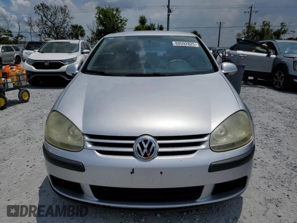 2009 Volkswagen Rabbit S с VIN WVWBA71KX9W048212, выставлен на аукционе Copart как лот 60592825 с пробегом 141 893 миль миль и Списание • Salvage title. История ставок и продаж доступна на DreamBid. Изображение 5.