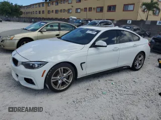 2018 BMW 4 Series 430i with VIN WBA4J1C57JBM11149, listed as a Copart auction lot 61179805 with 37,311 mi miles and Salvage title. Bid and sale history available at DreamBid. Image 1.