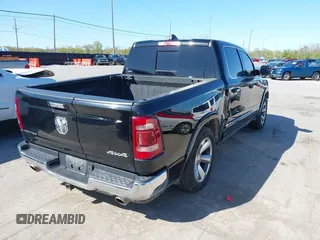 2020 Ram 1500 Limited with VIN 1C6SRFHT1LN219449, listed as a IAAI auction lot 42124421 with 117,976 mi miles and . Bid and sale history available at DreamBid. Image 4.