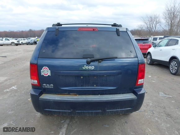 2010 Jeep Grand Cherokee Laredo with VIN 1J4PR4GK5AC138498, listed as a IAAI auction lot 41870740 with 130,551 mi miles. Bid and sale history available at carsss.com. Image 16.