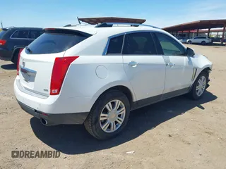2013 Cadillac SRX Luxury Collection with VIN 3GYFNCE38DS580168, listed as a IAAI auction lot 42122314 with 136,814 mi miles. Bid and sale history available at carsss.com. Image 4.