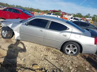 2010 Dodge Charger SXT with VIN 2B3CA3CV7AH312057, listed as a IAAI auction lot 38385104 with 178,259 mi miles and . Bid and sale history available at carsss.com. Image 3.