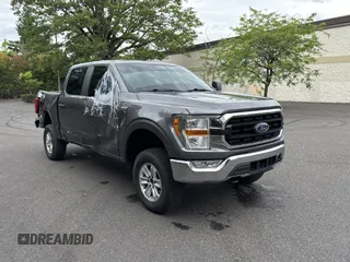 2021 Ford F-150 XL with VIN 1FTFW1E86MKD57397, listed as a Copart auction lot 62959355 with 59,227 mi miles and Salvage title. Bid and sale history available at DreamBid. Image 1.