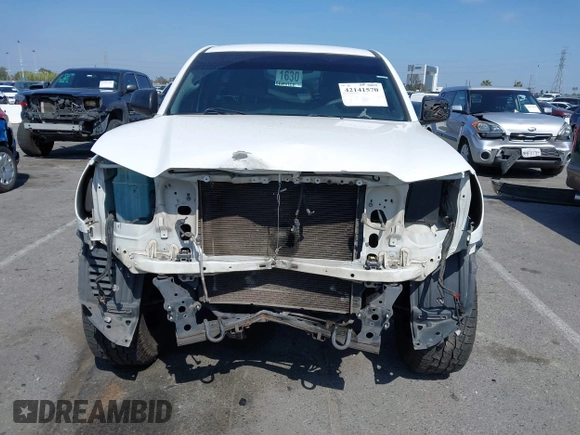 2014 Toyota Tacoma with VIN 5TFNX4CN7EX041191, listed as a IAAI auction lot 42141570 with 227,969 mi miles and . Bid and sale history available at DreamBid. Image 13.