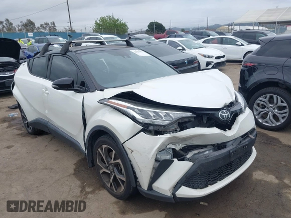 2020 Toyota C-HR LE with VIN JTNKHMBX9L1092934, listed as a IAAI auction lot 42021972 with 56,777 mi miles and . Bid and sale history available at DreamBid. Image 1.