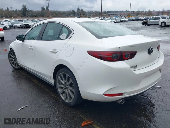 2020 Mazda 3 Premium with VIN 3MZBPBEMXLM133357, listed as a IAAI auction lot 41540234 with 81,280 mi miles and . Bid and sale history available at DreamBid. Image 3.