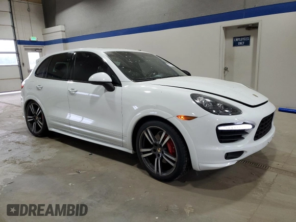 2013 Porsche Cayenne GTS with VIN WP1AD2A24DLA76344, listed as a Copart auction lot 83570884 with 63,704 mi miles and Salvage title. Bid and sale history available at DreamBid. Image 4.