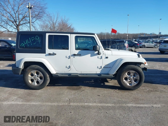 2013 Jeep Wrangler Unlimited Sahara with VIN 1C4BJWEG3DL658530, listed as a IAAI auction lot 41421006 with 115,321 mi miles and . Bid and sale history available at DreamBid. Image 14.