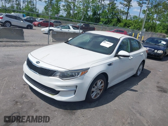 2016 Kia Optima LX z VIN KNAGT4L3XG5095972, wystawiony jako IAAI lot #42130422 z przebiegiem 103 420 mil mil oraz . Historia ofert i sprzedaży dostępna na DreamBid. Obrazek 2.
