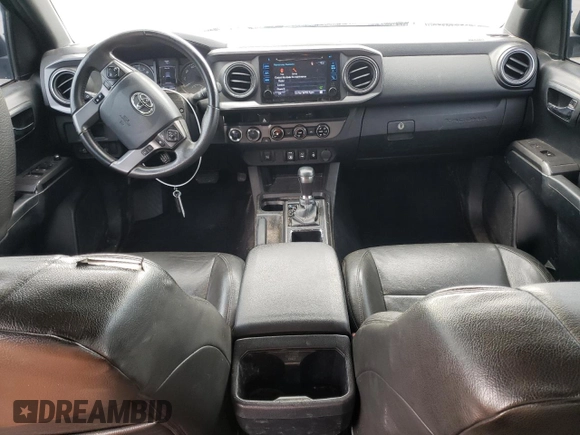 2018 Toyota Tacoma SR with VIN 5TFCZ5AN1JX147799, listed as a Copart auction lot 54337455 with 189,899 mi miles and Salvage Title. Bid and sale history available at DreamBid. Image 8.
