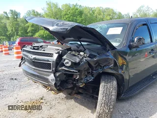 2013 Chevrolet Tahoe Commercial with VIN 1GNLC2E00DR265941, listed as a IAAI auction lot 42289977 with 206,840 mi miles and . Bid and sale history available at DreamBid. Image 6.