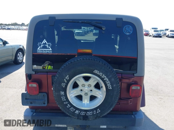 2004 Jeep Wrangler Sahara with VIN 1J4FA59S24P739581, listed as a IAAI auction lot 41696146 with 232,139 mi miles and . Bid and sale history available at DreamBid. Image 16.