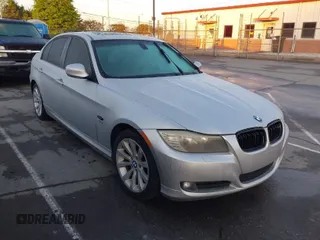 2011 BMW 3 Series 328i xDrive with VIN WBAPK5C56BA995973, listed as a IAAI auction lot 41991236 with 128,137 mi miles. Bid and sale history available at carsss.com. Image 1.