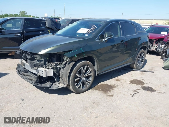 2021 Lexus RX 350 with VIN 2T2HZMAA2MC199129, listed as a IAAI auction lot 41990653 with 60,574 mi miles and . Bid and sale history available at DreamBid. Image 18.
