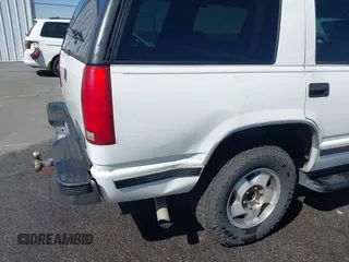 1999 Chevrolet Tahoe Z71 with VIN 1GNEK13R3XJ412067, listed as a IAAI auction lot 41789660 with 196,916 mi miles and . Bid and sale history available at DreamBid. Image 6.