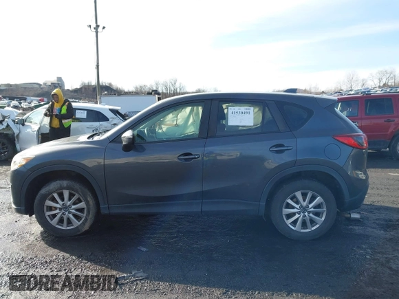 2015 Mazda CX-5 Sport with VIN JM3KE4BY1F0543507, listed as a IAAI auction lot 41530491 with 127,995 mi miles. Bid and sale history available at carsss.com. Image 14.