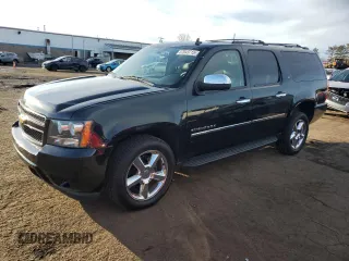 2011 Chevrolet Suburban LTZ with VIN 1GNSKKE33BR187175, listed as a Copart auction lot 47043715 with 200,540 mi miles and Salvage Title. Bid and sale history available at carsss.com. Image 1.