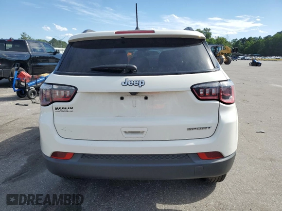 2018 Jeep Compass Sport with VIN 3C4NJCAB7JT140622, listed as a Copart auction lot 58162185 with 128,686 mi miles and Salvage title. Bid and sale history available at DreamBid. Image 6.