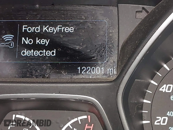 2015 Ford Escape Titanium with VIN 1FMCU0J96FUB81598, listed as a IAAI auction lot 41872114 with 122,001 mi miles and . Bid and sale history available at DreamBid. Image 15.