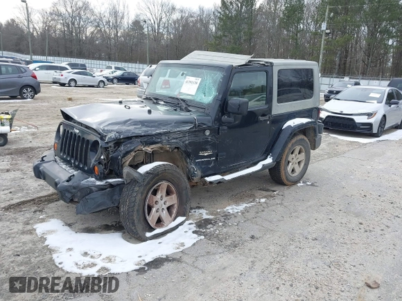 2007 Jeep Wrangler Sahara z VIN 1J8FA54107L202622, wystawiony jako IAAI lot #41391138 z przebiegiem 251 388 mil mil oraz . Historia ofert i sprzedaży dostępna na DreamBid. Obrazek 2.