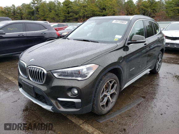 2018 BMW X1 xDrive28i with VIN WBXHT3C37J5K26738, listed as a Copart auction lot 35778903 with 34,916 mi miles. Bid and sale history available at carsss.com. Image 1.