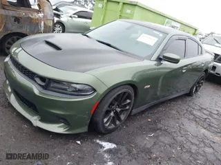 2021 Dodge Charger Scat Pack with VIN 2C3CDXGJ8MH616219, listed as a IAAI auction lot 41394474 with 59,434 mi miles. Bid and sale history available at carsss.com. Image 2.