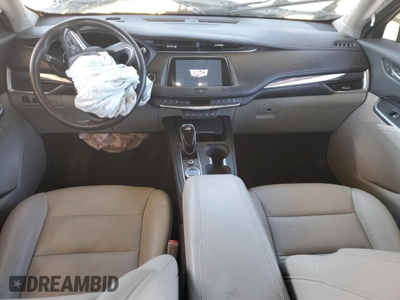 2021 Cadillac XT4 FWD Luxury с VIN 1GYAZAR47MF023407, выставлен на аукционе Copart как лот 88633325 с пробегом 77 353 миль миль и Списание • Salvage title. История ставок и продаж доступна на DreamBid. Изображение 8.
