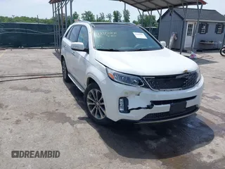 2014 Kia Sorento SX z VIN 5XYKWDA70EG541044, wystawiony jako IAAI lot #42301841 z przebiegiem 196 550 mil mil oraz . Historia ofert i sprzedaży dostępna na DreamBid. Obrazek 1.