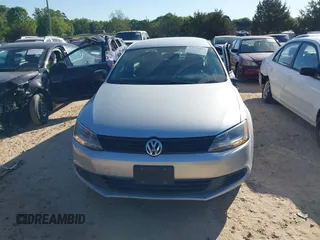 2014 Volkswagen Jetta Sedan S with VIN 3VW2K7AJ4EM208158, listed as a IAAI auction lot 42037477 with 156,483 mi miles. Bid and sale history available at carsss.com. Image 12.
