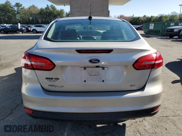 2018 Ford Focus SE with VIN 1FADP3F23JL219189, listed as a Copart auction lot 52209335 with 101,180 mi miles and Salvage title. Bid and sale history available at DreamBid. Image 6.