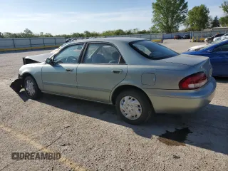 1999 Mazda 626 ES with VIN 1YVGF22C4X5887335, listed as a Copart auction lot 51726654 with 147,359 mi miles and Salvage Title. Bid and sale history available at carsss.com. Image 2.