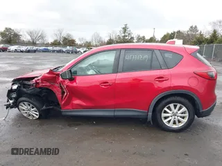 2014 Mazda CX-5 Touring with VIN JM3KE2CY2E0322211, listed as a IAAI auction lot 41721219 with 127,312 mi miles. Bid and sale history available at carsss.com. Image 14.