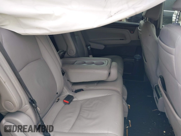 2022 Honda Odyssey Touring with VIN 5FNRL6H80NB023623, listed as a IAAI auction lot 41512586 with 63,329 mi miles and . Bid and sale history available at DreamBid. Image 8.
