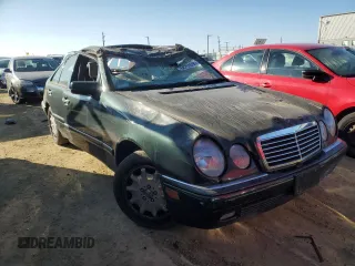 1996 Mercedes-Benz E-Class with VIN WDBJF55FXTJ011680, listed as a Copart auction lot 88752555 with 0 mi miles and Salvage Title. Bid and sale history available at carsss.com. Image 4.