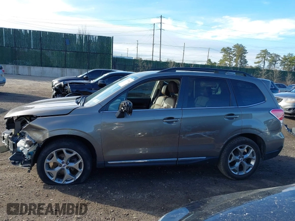 2017 Subaru Forester Touring z VIN JF2SJAWC9HH507636, wystawiony jako IAAI lot #41801988 z przebiegiem 32 030 mil mil oraz . Historia ofert i sprzedaży dostępna na DreamBid. Obrazek 14.