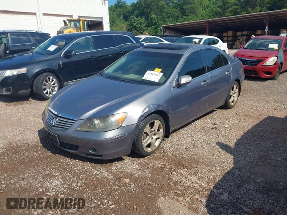 2006 Acura RL with VIN JH4KB16536C010572, listed as a IAAI auction lot 42562533 with 351,065 mi miles and . Bid and sale history available at DreamBid. Image 2.